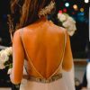 Vestido de novia con espalda descubierta y transparencias