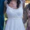 Vestido de novia con top plisado y aplicaciones de encaje