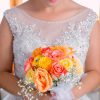 Vestido de novia con escote de corazon, pedreria y transparencias