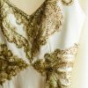 Vestido usado de novia bordado a mano en tonos dorados por Francisca Larraín