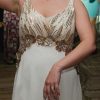 Vestido de novia Blanca Bonita con aplicaciones doradas y transparencias