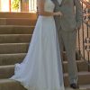 Vestido de novia con bordados a mano y transparencias