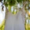 Vestido de novia de seda con pedrería bordada por MLV Novias
